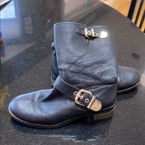 Black Vince Camuto boots.